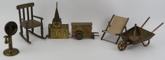 A collection of brass and copper miniature and mechanical music models. Comprising a brass