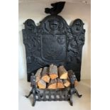 A good antique cast iron fireback, decorated in relief with The Viscount Cowdray's crest, 'Do it