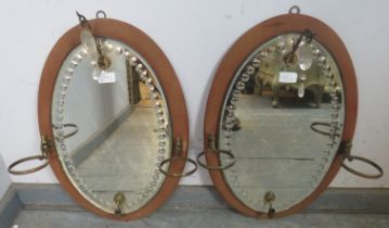 A pair of 19th century Clarke's Patent 'Fairy lights', girandole wall mirrors, the fabric covered
