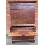 A George III mahogany secretaire chest on chest, having a dentil cornice above two short over