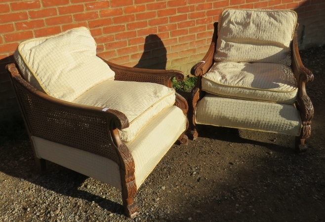 A pair of early/mid 20th century Bergere armchairs, having ornately carved show-wood frames, - Image 2 of 3