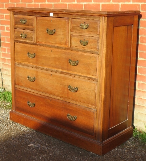 A turn of the century walnut bedroom chest, the central hat drawer flanked by four short drawers, - Image 3 of 3