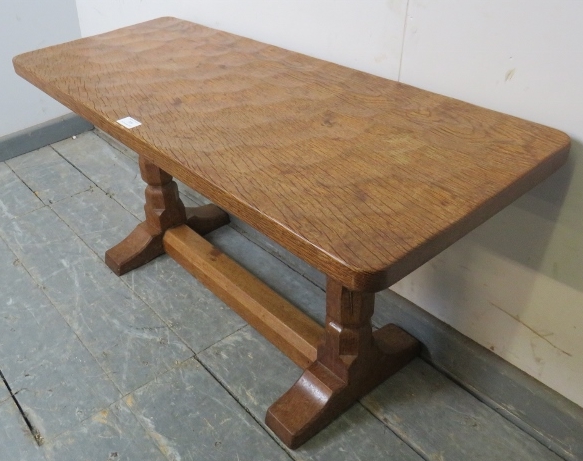 A vintage carved oak low side table by Robert Thompson, the 'Mouseman', the adzed top on tapering - Image 2 of 3