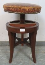 A Victorian mahogany music stool, with circular height adjustable seat, (a/f).