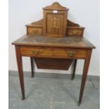 An Edwardian rosewood ladies writing desk, having marquetry inlay and satinwood strung, the upper