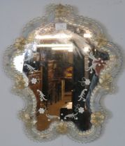 A vintage Venetian wall mirror of traditional form with applied and etched decoration. H50cm