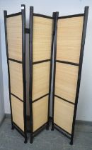 A pair of ebonised bamboo and sisal three-section folding screens/room dividers. H175cm W41cm