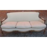 A stylish vintage sofa in the George III French Hepplewhite style, 20th century, elegant show-wood