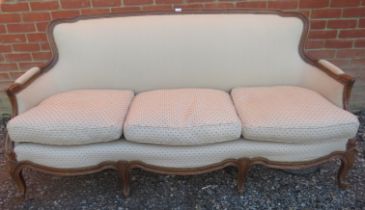 A stylish vintage sofa in the George III French Hepplewhite style, 20th century, elegant show-wood