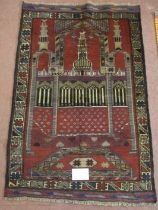 A Persian Beluchi rug. Temple scene on red ground and in good condition. 137cm x 90cm.