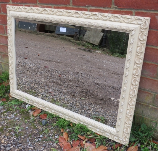A period-style cream finished wall mirror with relief moulded decoration. 90cm x 65m (approx). - Image 2 of 2