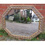 A decorative period-style octagonal wall mirror, 20th century, gilt and paint effect finish. 90cm