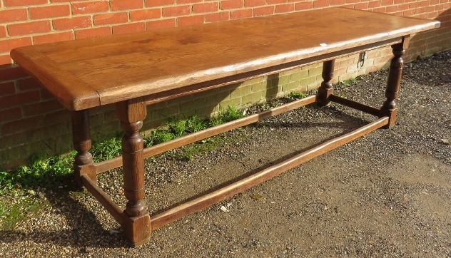 A large oak refectory table in the 17th century taste, on turned and block supports joined by - Image 2 of 3