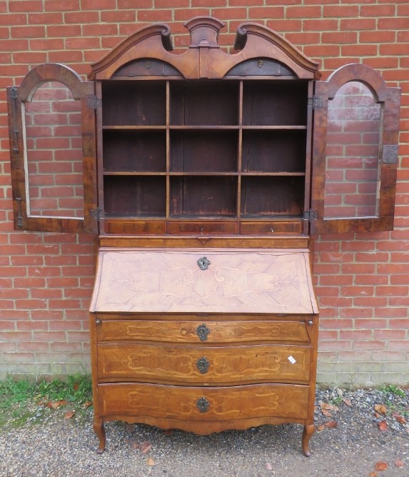 A large 18th century Continental marquetry bureau bookcase, having a broken and scrolled pediment - Image 3 of 4