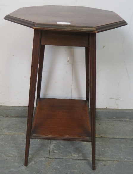 An Edwardian marquetry inlaid and satinwood banded octagonal mahogany two-tier side table. W42cm (