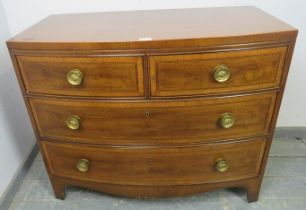 A George III design bow front chest, 20th century with a satinwood banded mahogany effect finish,