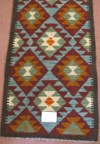 A Maimana Kilim runner, repeat diamond pattern. Good colours and condition. 201cm x 65cm.