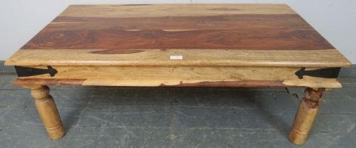 An Eastern Jali wood rectangular coffee table, with metal bound corners, on turned supports. H40cm