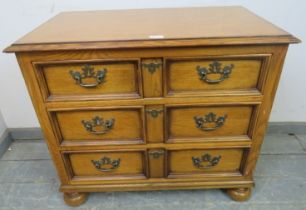 A good quality Jacobean style light oak finished chest of drawers by Drexel Heritage, 20th