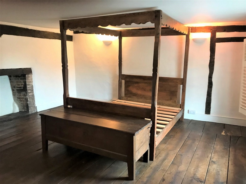 A handmade French medium oak king size four-poster bed in the Gothic taste.