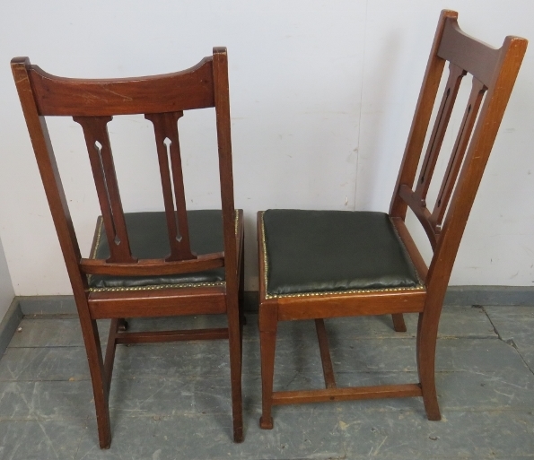 Four Arts & Crafts mahogany dining chairs by Maple & Co, having pierced backrests and seats - Image 3 of 5