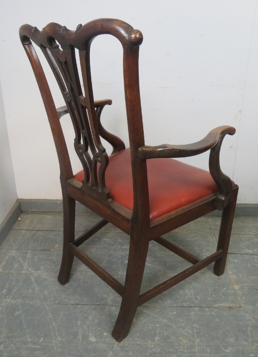 A Georgian mahogany elbow chair in the manner of Chippendale, having carved and pierced back, - Image 4 of 4