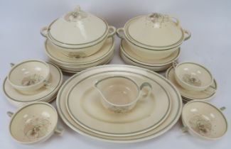 A Susie Copper ‘Magnolia’ pattern part dinner service. Comprising seven dinner plates, six dessert