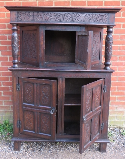 A 17th century and later oak court cupboard, the top section with central cupboard flanked by relief - Image 3 of 4