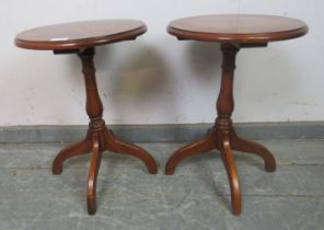 A pair of reproduction Regency style solid hardwood wine tables, 36cm x diameter.