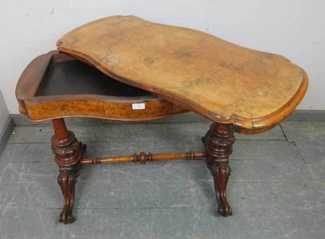A Victorian figural walnut card table, the serpentine rectangular top with inverted rounded corners, - Image 3 of 3