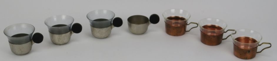 Bauhaus school: A set of four German chromed steel and bakelite handled tea cup holders attributed