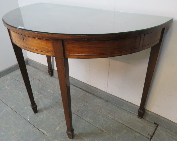 A Georgian mahogany demi-lune serving table strung with ebony, housing three blind drawers, on - Image 2 of 3