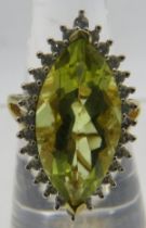 A silver gold overlay faceted marquise cut quartz & white stone ring, size M. Approx 27mm x 17mm,