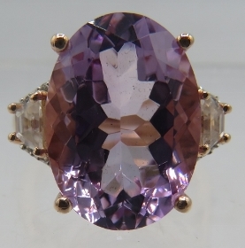 A Rose de France faceted amethyst cocktail ring, 18mm x 13mm approx, marked 925, size O. Good cut,