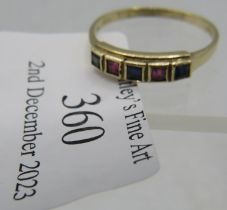 A 9ct yellow gold ring set with three sapphires and two rubies, each in a square setting, size P,