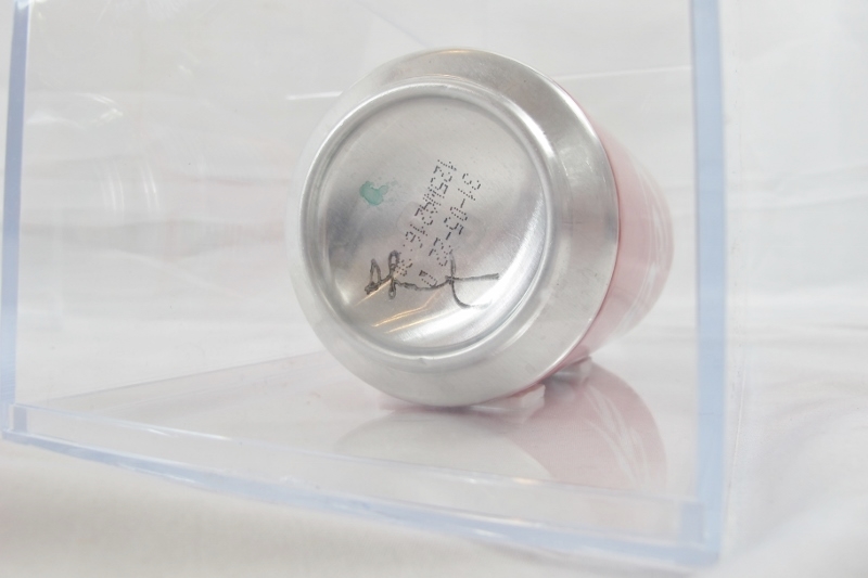 Damien Hirst (British, b.1965) - Signed Coke can, displayed in a perspex case, 20cm long.