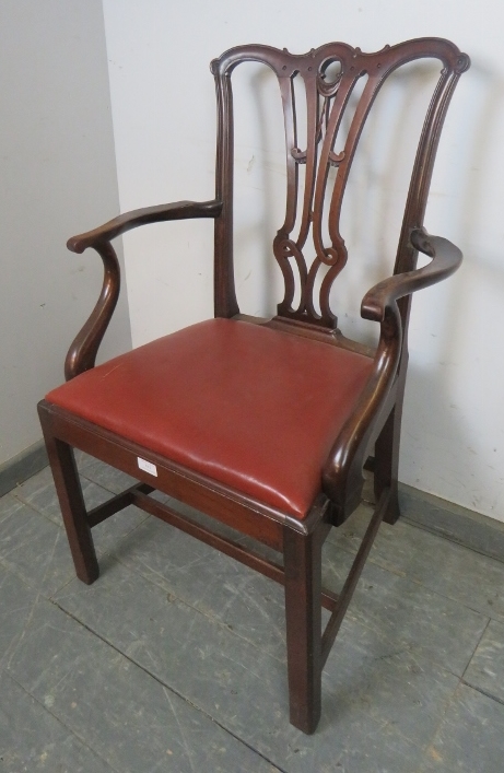 A Georgian mahogany elbow chair in the manner of Chippendale, having carved and pierced back, - Image 2 of 4
