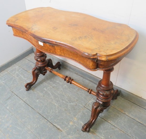 A Victorian figural walnut card table, the serpentine rectangular top with inverted rounded corners, - Image 2 of 3