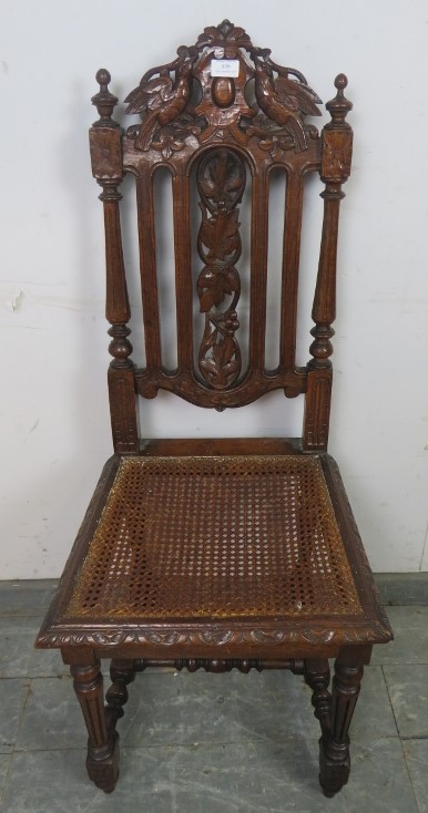 A 19th century Carolean Revival carved oak single chair/hall chair, with caned seat and machined - Image 4 of 5