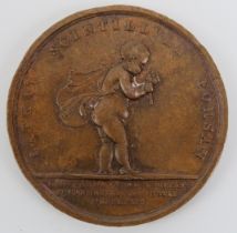 A bronze Royal Human Society lifesaving award medallion. Obverse: Depicting an infant facing right