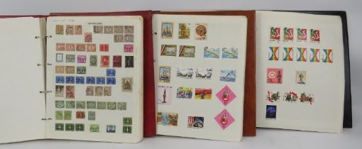 Three stamp albums, 20th century. (3 items). Condition report: Viewing advised. Stamps laid on