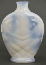 A vintage opaline glass ‘Owl’ vase, circa 1970s. Of compressed ovoid form with stylised features.