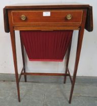 An Edwardian mahogany drop-leaf worktable, strung with satinwood, housing one long drawer with