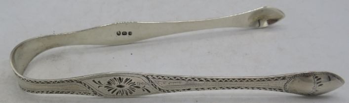 A pair of Georgian silver bright cut sugar tongs, London 1795, Peter & Ann Bateman. Approx weight