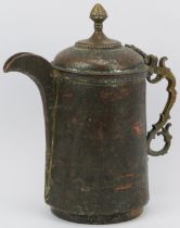 An Indo-Persian metalwork lidded decanter jug with embossed decoration, 19th century. With a