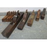 A collection of vintage and antique woodworking planes. Condition report: Age and use related wear.