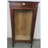 An Edwardian mahogany glazed display cabinet of small proportions, satinwood strung and with