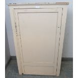 A vintage pine and plywood pantry cupboard painted cream, housing two loose shelves. H112cm W70cm