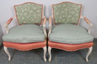A pair of French Louis XV revival open sided armchairs, 20th century, upholstered backs and seats,