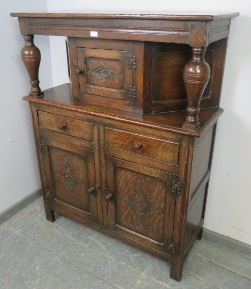 A good solid early 20th century court cupboard in the late 17th century style, good carved panels, - Image 2 of 3